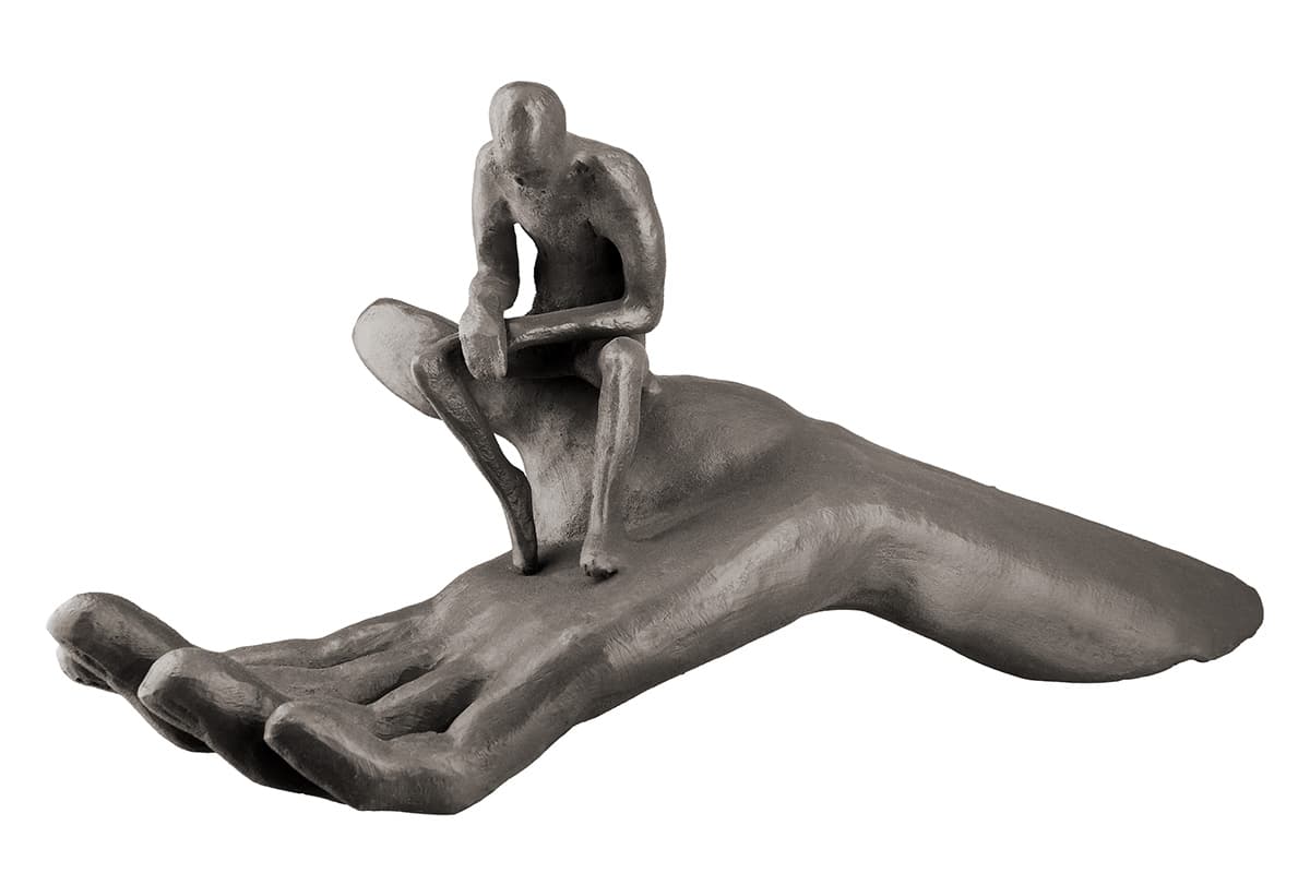 Man on Hand Sculpture